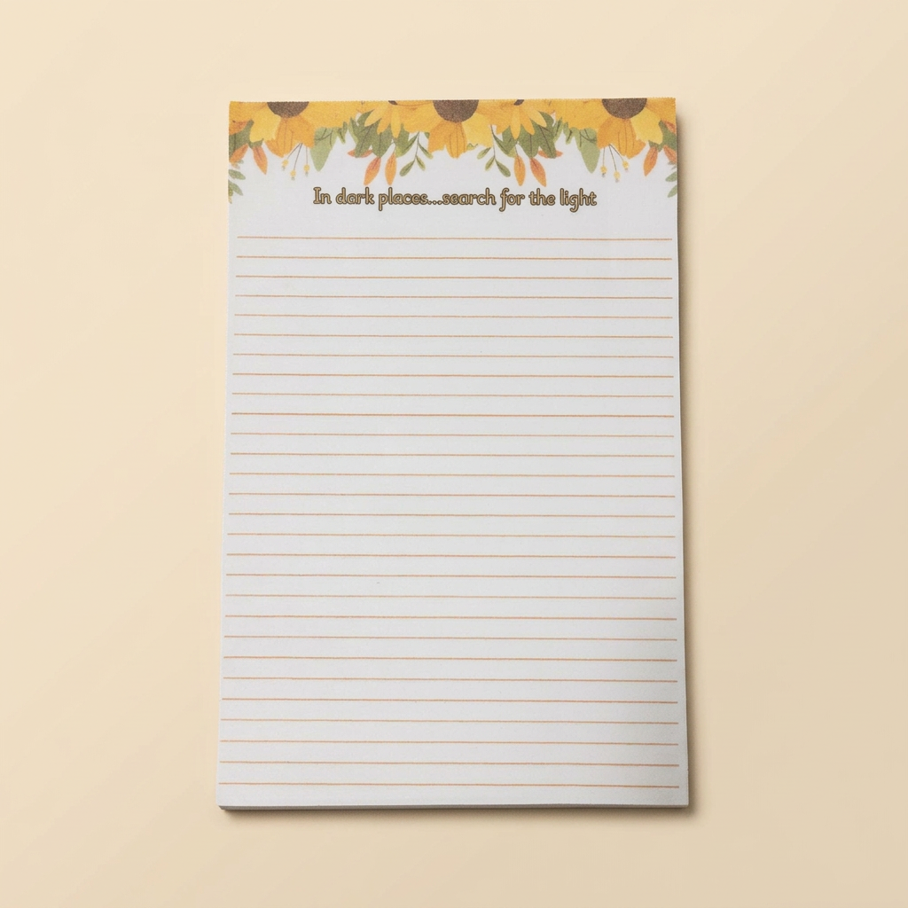 Individual sunflower notepad on a soft cream background