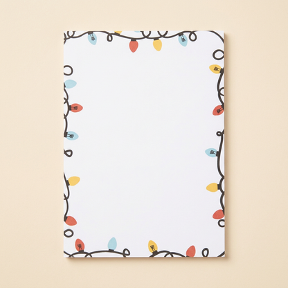 Individual Christmas Lights notepad on a soft cream background