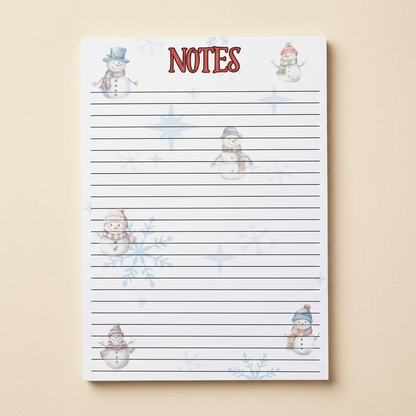 Individual snowman notepad on a soft cream background