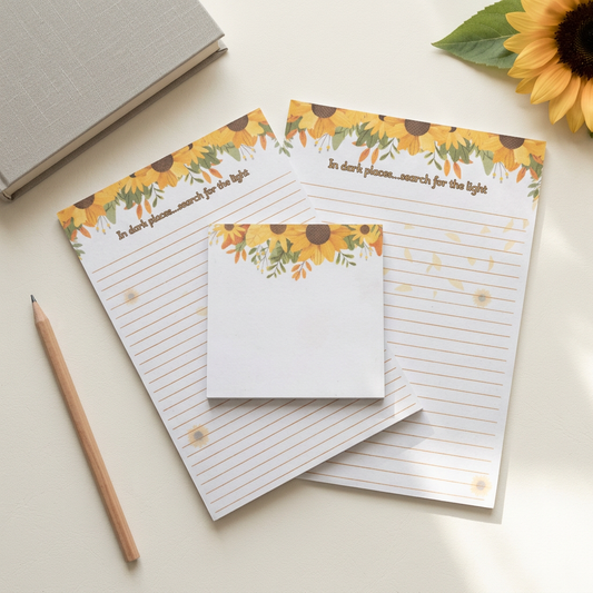 Sunflower stationery in a bright workspace flat lay